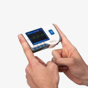 Photo of hands holding portable electrocardiogram device
