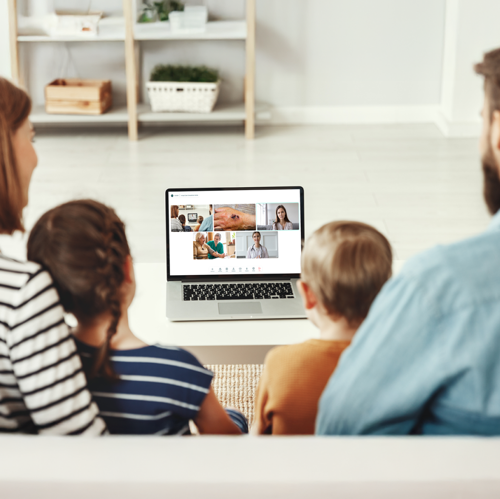 Family in a Vision Home virtual care consult with their elderly loved one and their care team